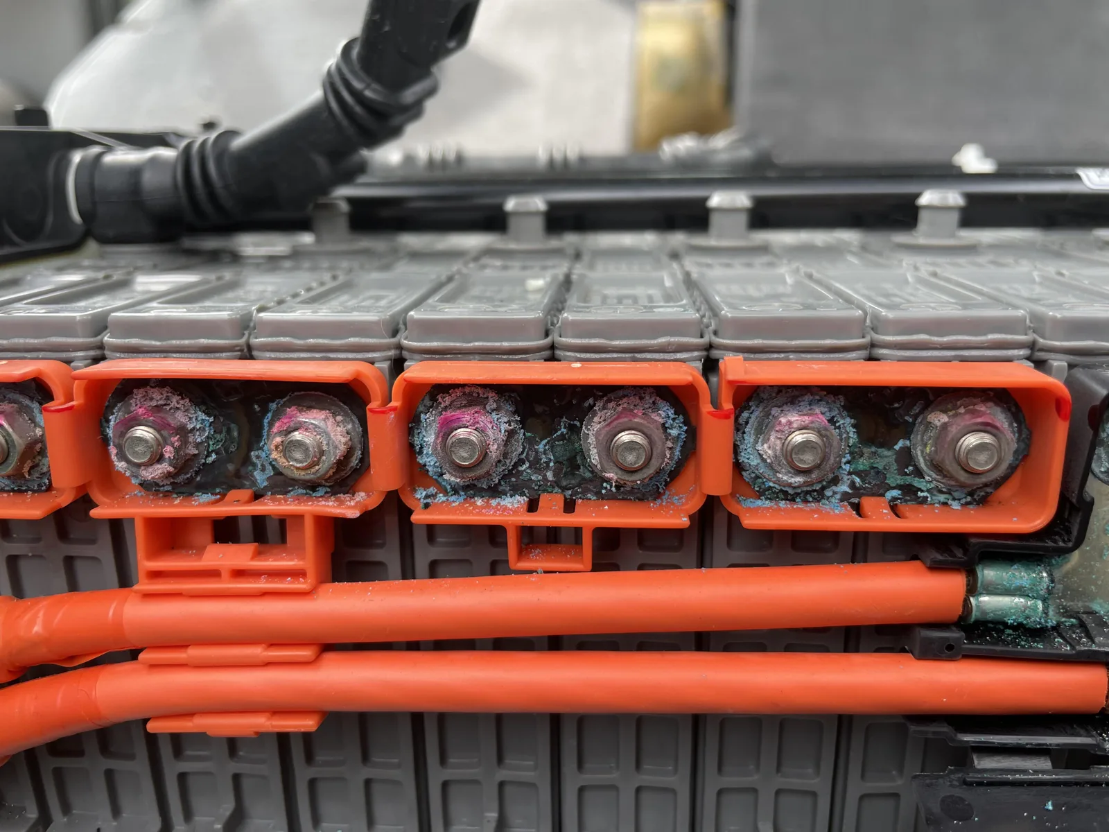 Corroded bus bars and nuts on a Prius hybrid battery